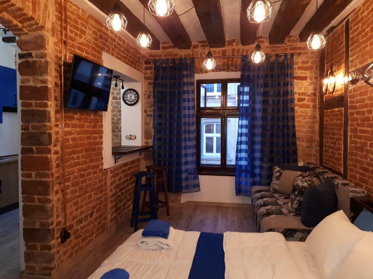 Дизайнерські апартаменти в стилі Loft в самому серці Львова Экстерьер фото